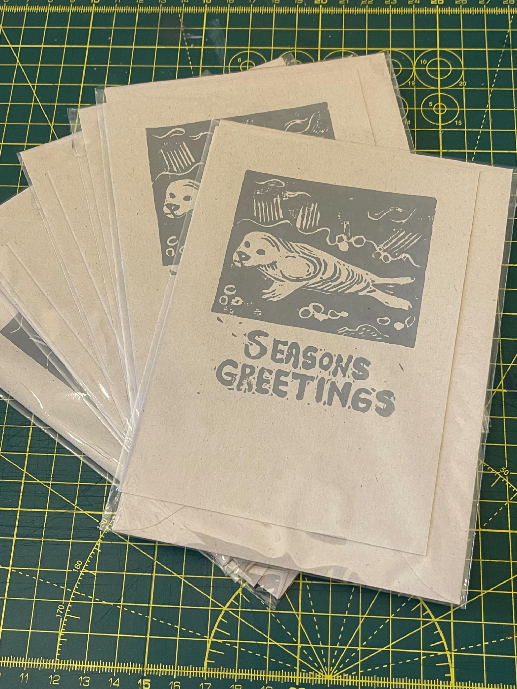 Seal on unbleached card 